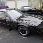 Two KITTS from the show Knight Rider